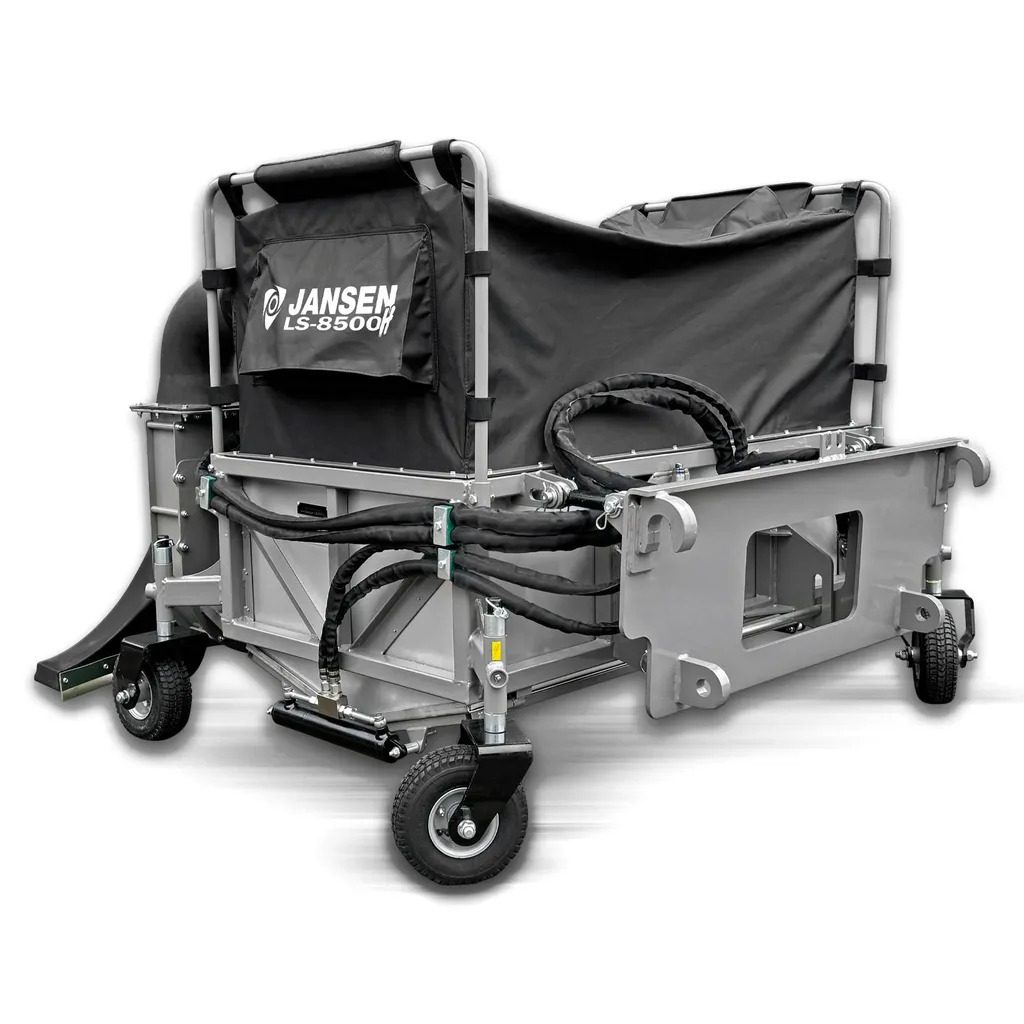 Achterkant van de Jansen LS-8500H met de bevestiging voor de voorlader en de hydrauliekslangen